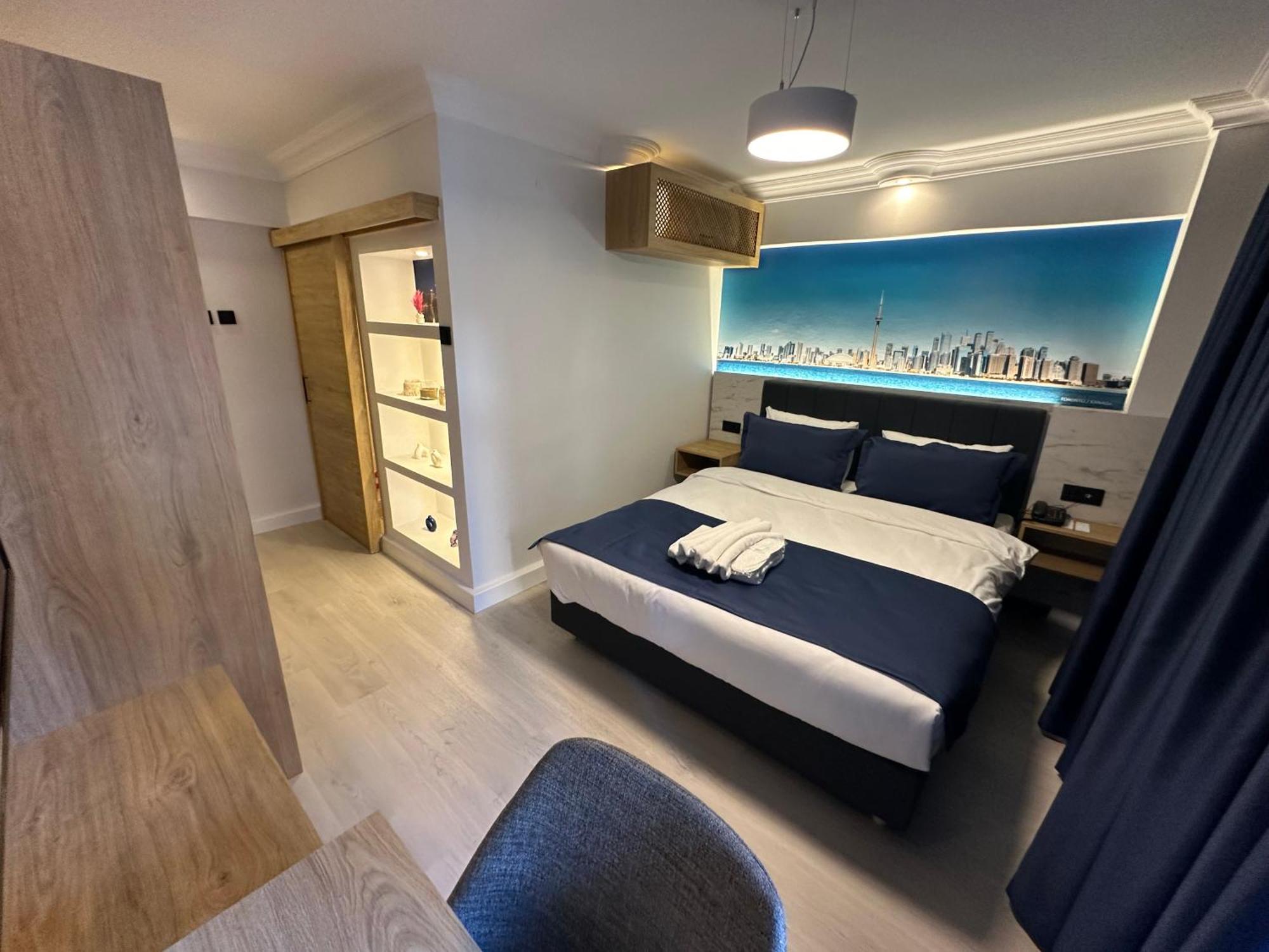 Bella Otel Мудания Екстериор снимка