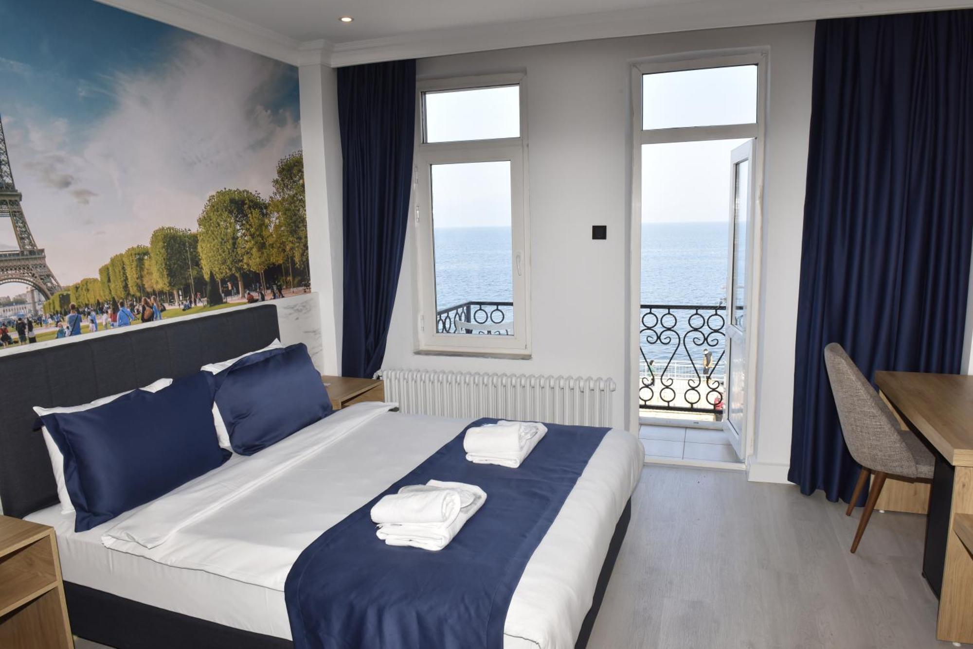Bella Otel Мудания Екстериор снимка