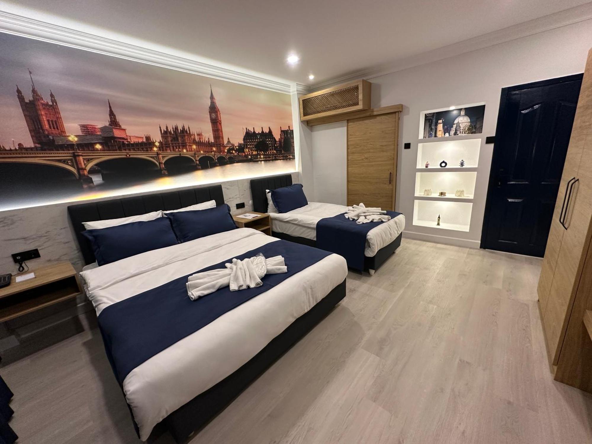 Bella Otel Мудания Екстериор снимка