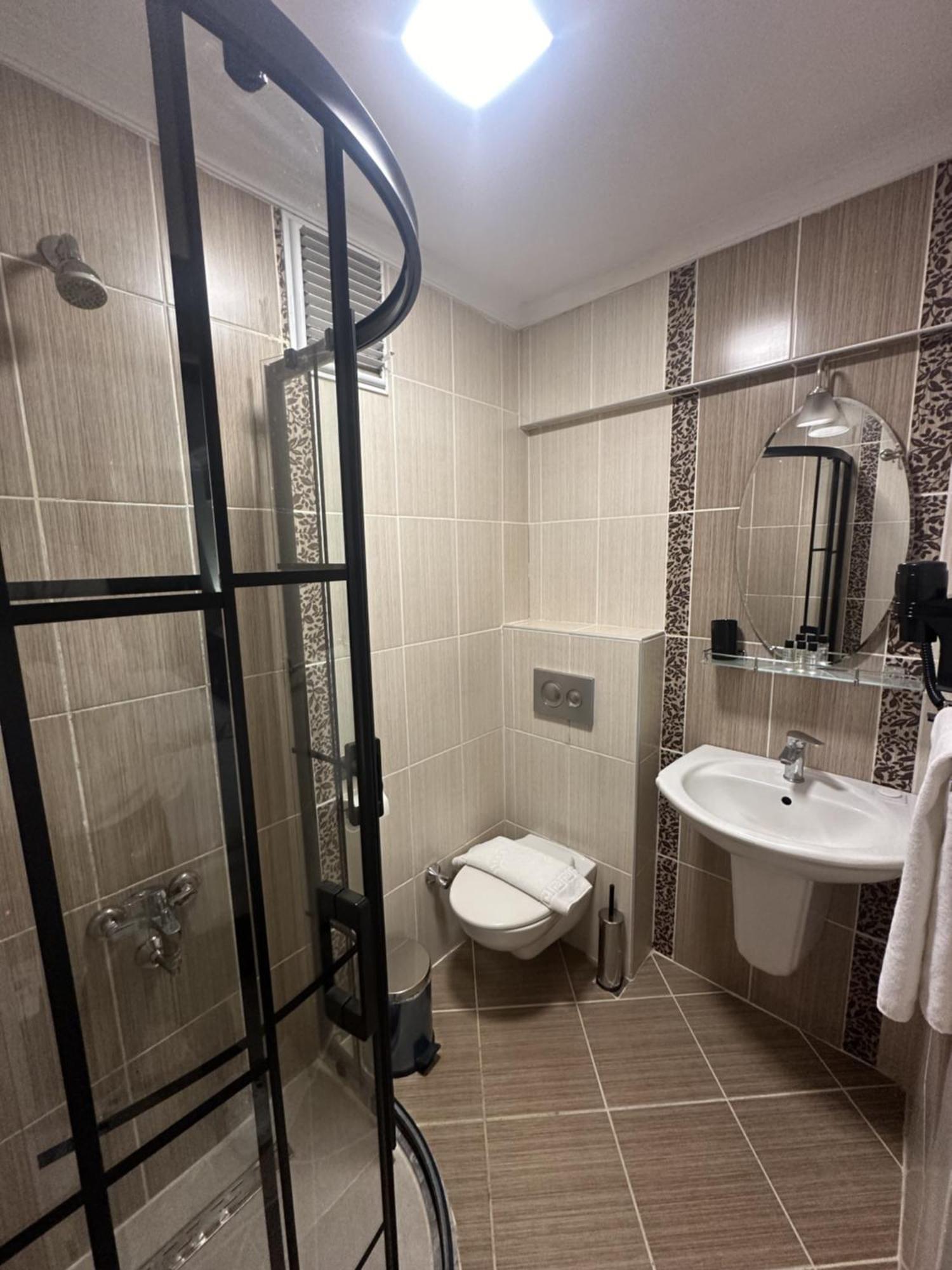 Bella Otel Мудания Екстериор снимка