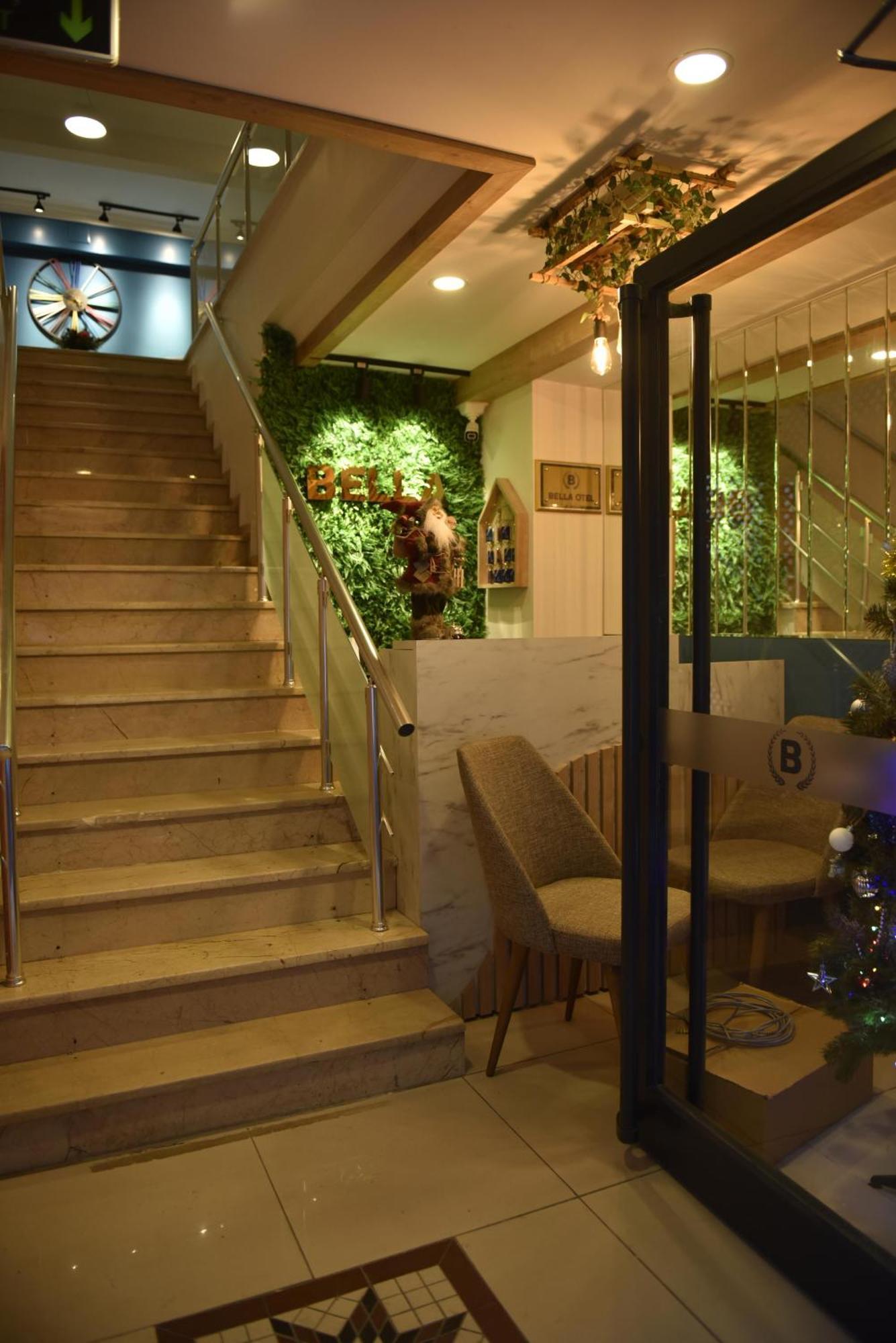 Bella Otel Мудания Екстериор снимка