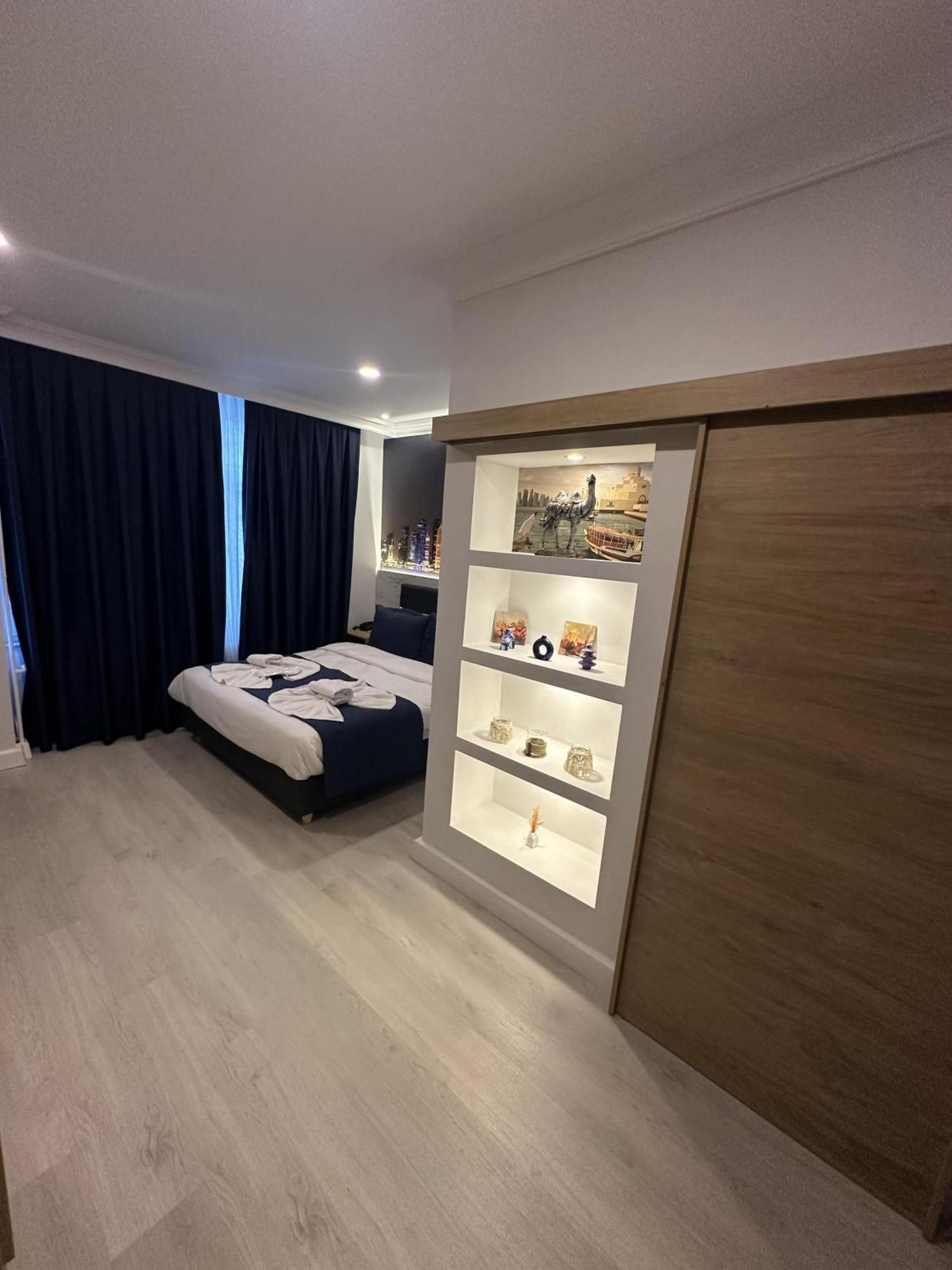Bella Otel Мудания Екстериор снимка