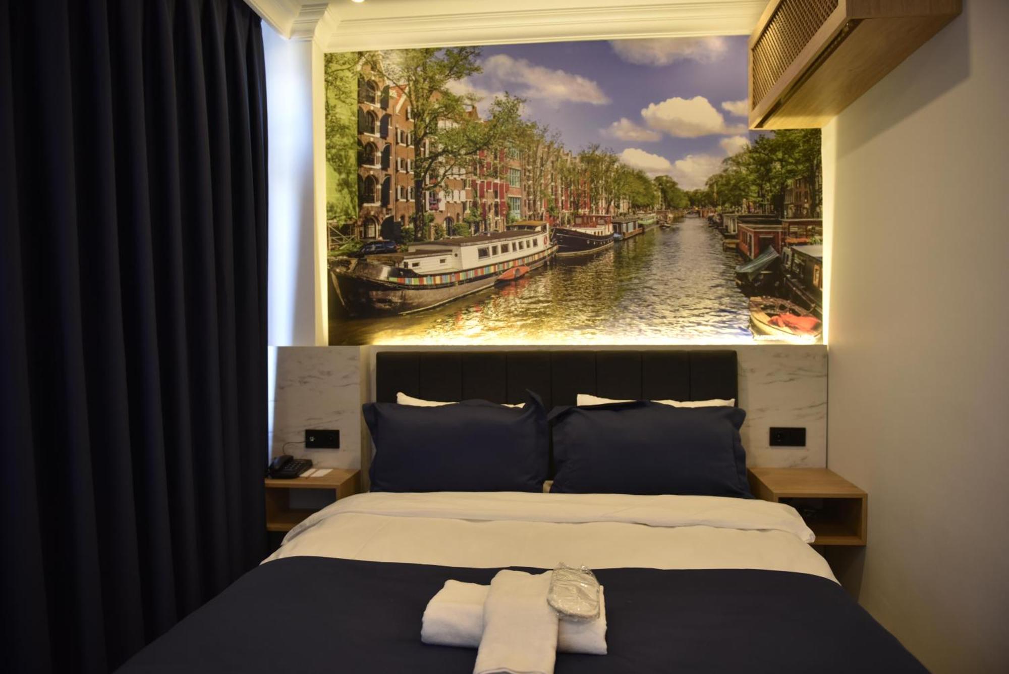 Bella Otel Мудания Екстериор снимка