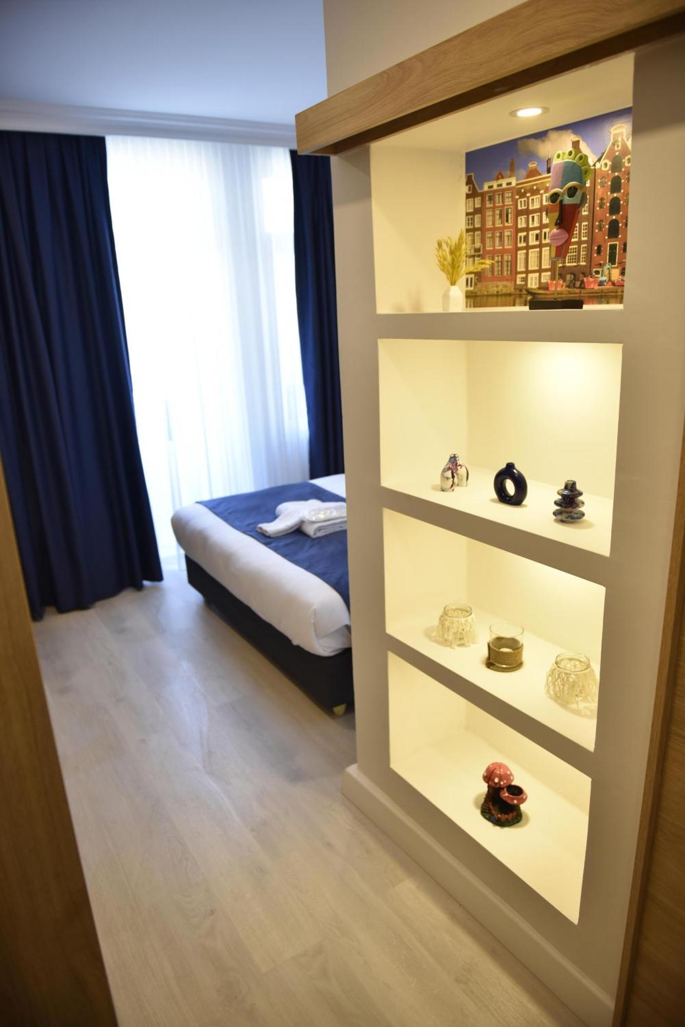 Bella Otel Мудания Екстериор снимка