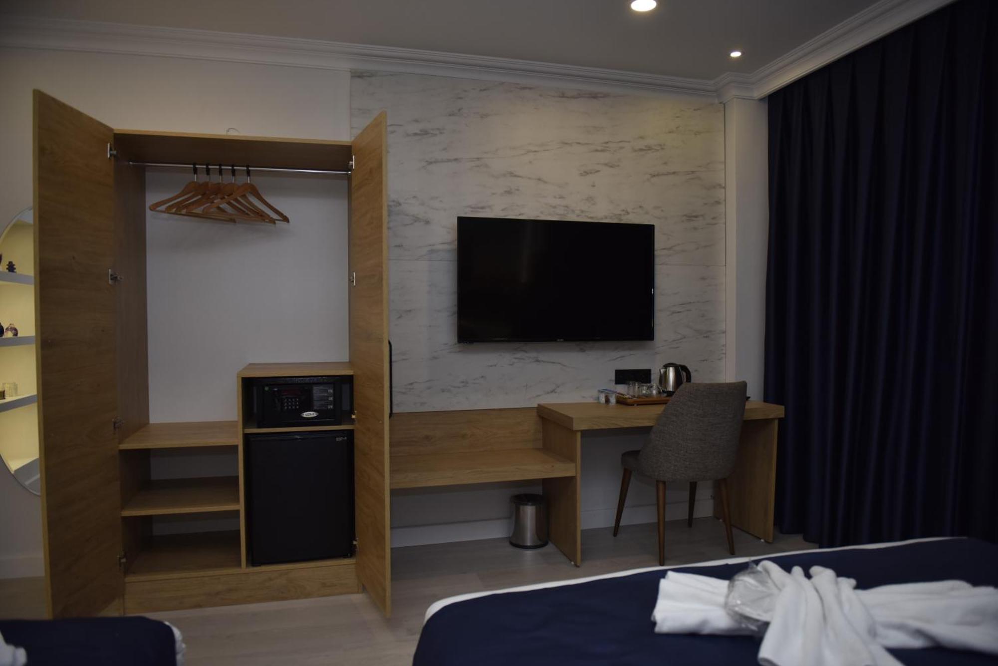 Bella Otel Мудания Екстериор снимка